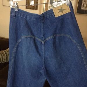 70s wide leg rainbow stripe jeans.
